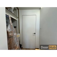 White HPL Interior Door with Timeless Gold Anodized Profile – Developer-Grade Supply UAE